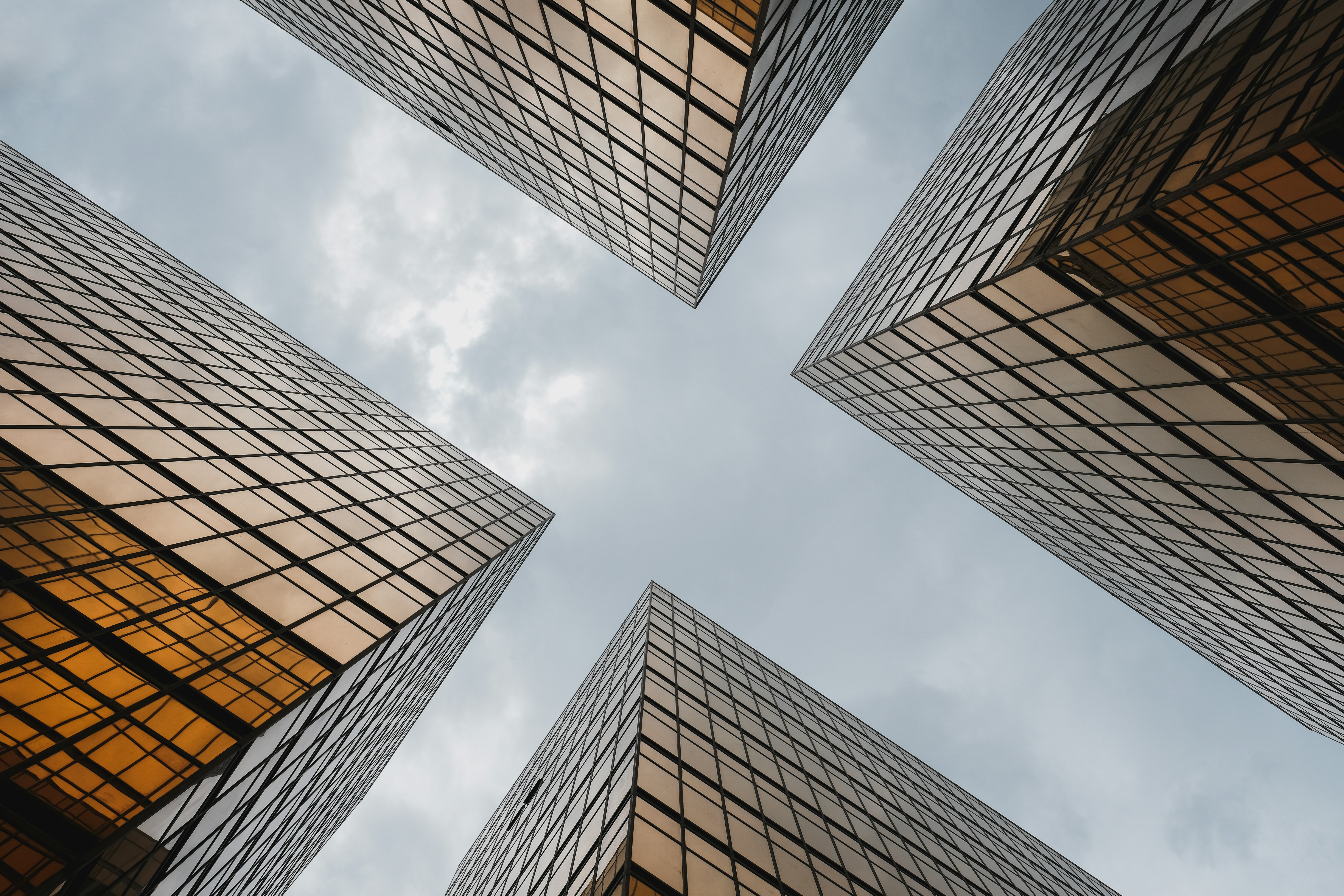 low-angle photography of high-rise buildings